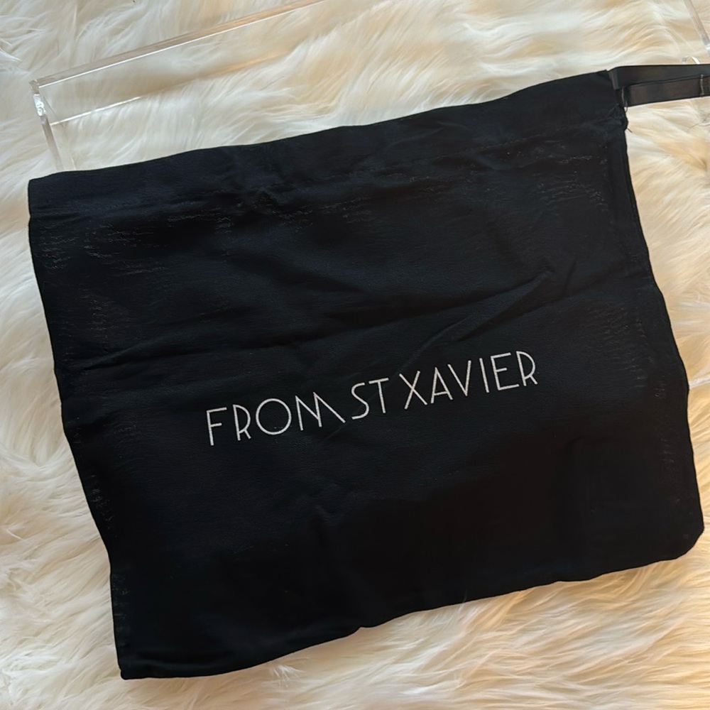 From St Xavier Dust Bag in black new like condition 14x12